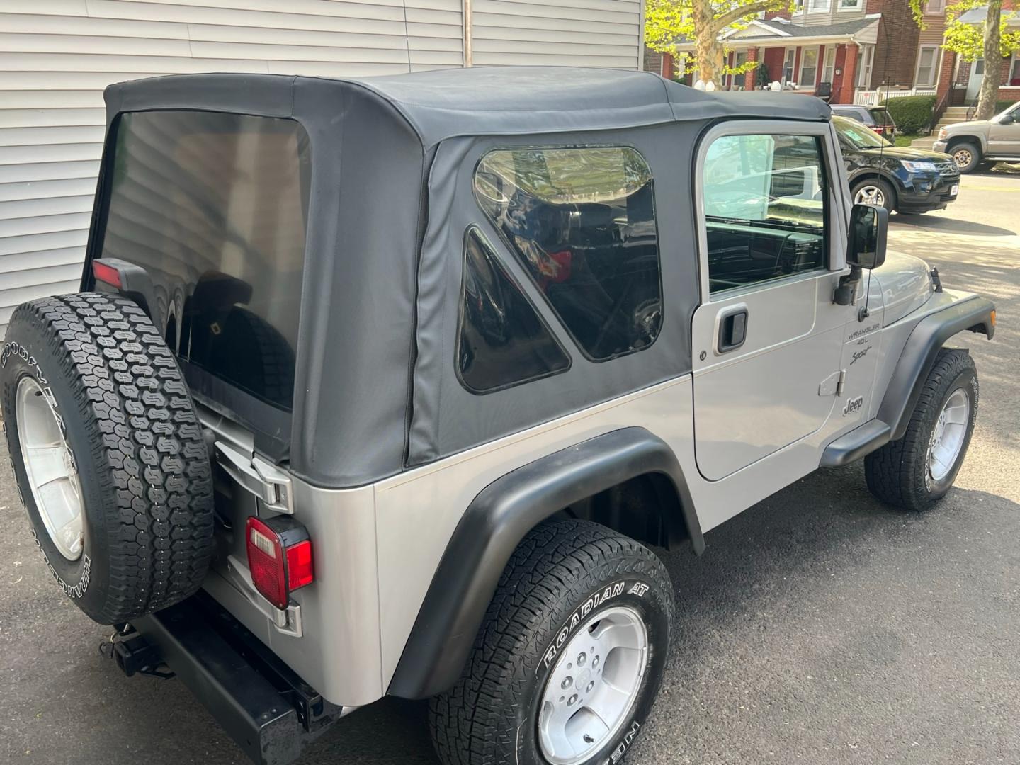2001 SILVER Jeep Wrangler Sport (1J4FA49S21P) with an 4.0L L6 OHV 12V engine, located at 1018 Brunswick Ave, Trenton, NJ, 08638, (609) 989-0900, 40.240086, -74.748085 - Photo#3